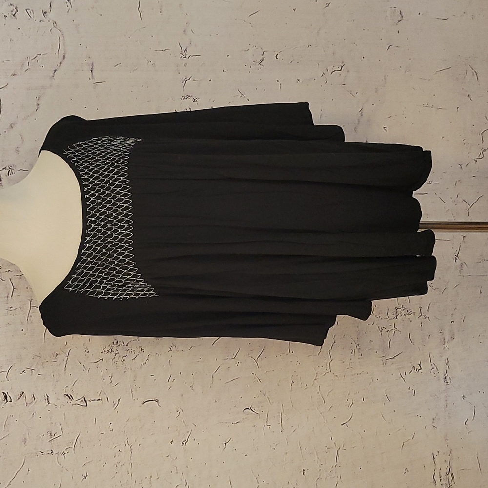 Black blouse with silver pattern on chest